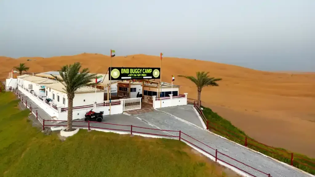 Dune buggies in the red desert near Dubai in the morning